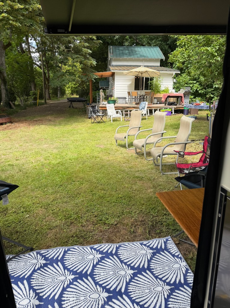 View from inside the van of chairs set up for a party